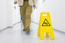 Slip and fall sign with man walking