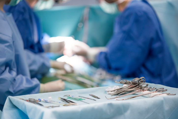 doctors performing surgery in hospital