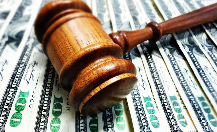 gavel and money: personal injury settlement