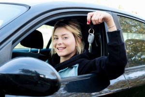 teenage girl driver with car keys