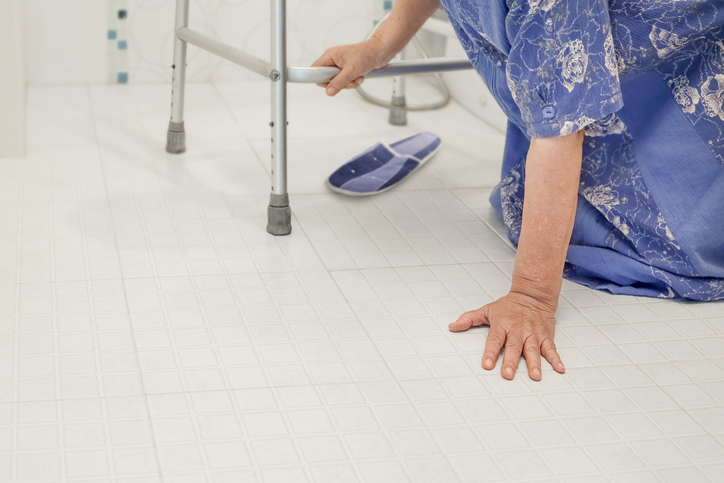 elderly woman falling in bathroom because slippery surfaces