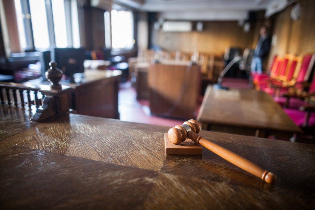 Image of a courtroom and gavel