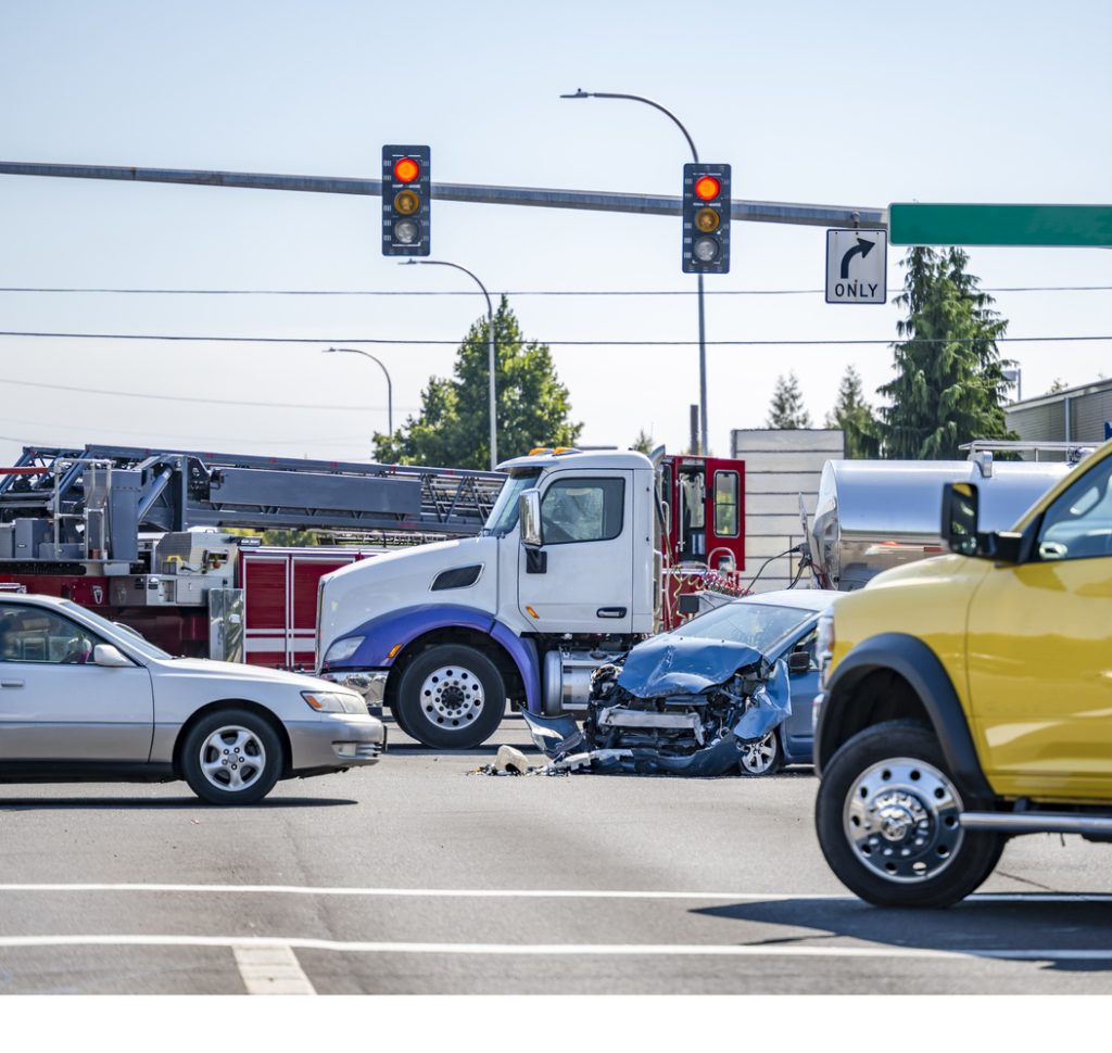 Intersection accident involving a car and a semi truck