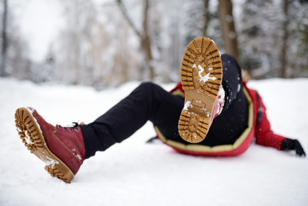 A person who slipped and fell on an icy path